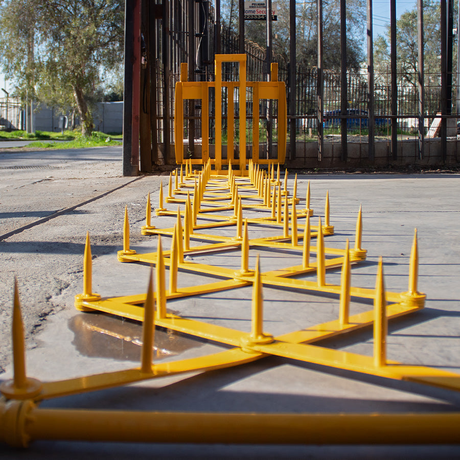 Barrera Pincha Neumáticos Desplegable Movimetal